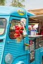 Vintage blue food truck on a country fair