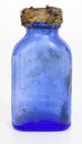 Vintage Blue Medicine Bottle with Rusty Cap Royalty Free Stock Photo