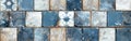 Vintage Blue Mosaic Motif Tiles on White Worn Cement Wall Texture - Seamless Pattern Background with Circle Print Royalty Free Stock Photo