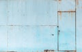 Vintage blue rusty metal sheet door texture background