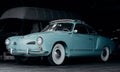 Vintage blue Volkswagen Karmann Ghia in the garage