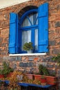 Vintage blue window with shutter (Greece) Royalty Free Stock Photo