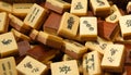 Vintage Bone and bamboo Mahjong or mah-jongg playing tiles in box.