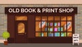 Vintage book shop store facade with storefront large window, columns and brick wall Royalty Free Stock Photo