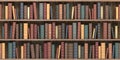 Vintage books on old wooden shelf. Old library or antique bookshop. Tiled seamless texture, wallpaper or background Royalty Free Stock Photo