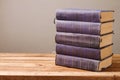 Vintage books stack on wooden table with copy space Royalty Free Stock Photo