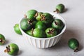 Vintage bowl full of green feijoa fruit Royalty Free Stock Photo
