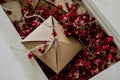 Vintage boxes with dried red flowers on a white bed. Concept Nostalgic and remembrance vintage background