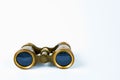 Vintage brass binoculars on white background Royalty Free Stock Photo