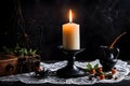 Vintage brass candelabra of five burning candles with dripping wax on a black background vertical background. photo