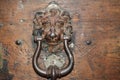 Vintage brass door knocker on an old door, Italy, Rome Royalty Free Stock Photo