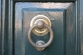 Vintage brass door knocker on an old door, Italy, Rome Royalty Free Stock Photo