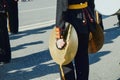 Vintage brass hand cymbals closeup in hands of musician of military orchestra.Musicians of the military brass band