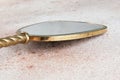 Vintage brass hand mirror Royalty Free Stock Photo