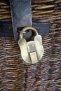 Vintage Brass Lock on a Whicker Chest Royalty Free Stock Photo