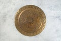 Vintage brass plate with embossed floral pattern Royalty Free Stock Photo