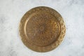 Vintage brass plate with embossed floral pattern Royalty Free Stock Photo