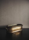 Vintage brazen metal bowl on dark background Royalty Free Stock Photo