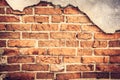 Vintage brick wall with cracked concrete background Royalty Free Stock Photo