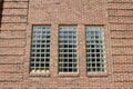Vintage brick wall texture background with attractive glass block windows Royalty Free Stock Photo