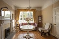 Vintage British living room with wooden floors and lilies Royalty Free Stock Photo