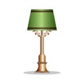 Vintage bronze desk lamp with the green lamp shade. Royalty Free Stock Photo