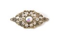 Vintage brooch with diamonds isolated on white