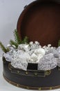 Vintage brouwn coffer with white christmas tree decoration and s
