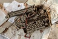 A vintage brown beige broken typewriter