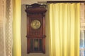 The vintage brown wooden clock Royalty Free Stock Photo