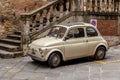 Vintage buggy car parked in a street in Siena, Italy