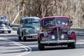 Vintage 1940 Buick Special Coupe driving on country road