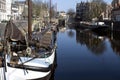 Vintage buildings and masts of ships in Rotterdam