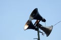 Vintage bullhorn or megaphone, loudspeaker outdoor on the sky background, concept, public relations sound, notify news, warning Royalty Free Stock Photo