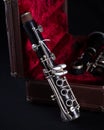 Vintage Bundy Wood Body Clarinet in Original Red Velvet-Lined Hard Case close up Royalty Free Stock Photo