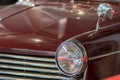 Vintage Burgundy Classic Car. Close-up Of Headlamp And Grill