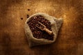 Vintage burlap coffee sack with roasted beans top view