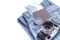 Vintage camera. compass, passport, money and jeans prepared for travel Royalty Free Stock Photo