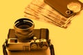 Vintage camera, compass, passport and money prepared for travel Royalty Free Stock Photo