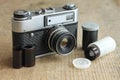 Vintage camera with film and case Royalty Free Stock Photo