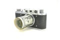 Vintage camera and money on a white background close-up Royalty Free Stock Photo
