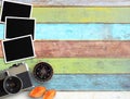 Vintage camera and old blank photo frame on office desk Royalty Free Stock Photo