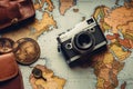 Vintage camera on old map background. Travel and adventure concept, Top view travel concept with retro camera films, map and Royalty Free Stock Photo