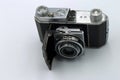 Vintage camera with open lenses on white background Royalty Free Stock Photo
