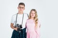 Vintage camera technology. shooting with professional camera. photographing is their hobby. teen children with retro