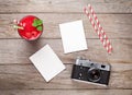 Vintage camera, two photos and raspberry smoothie Royalty Free Stock Photo