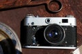 Vintage camera on a wooden background at a flea market Royalty Free Stock Photo