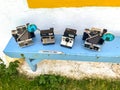 Old Vintage cameras on blue bench