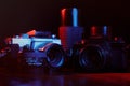 Vintage cameras and lenses illuminated in red and blue