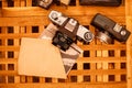 Vintage cameras from the times of the USSR lie on the table, on Royalty Free Stock Photo